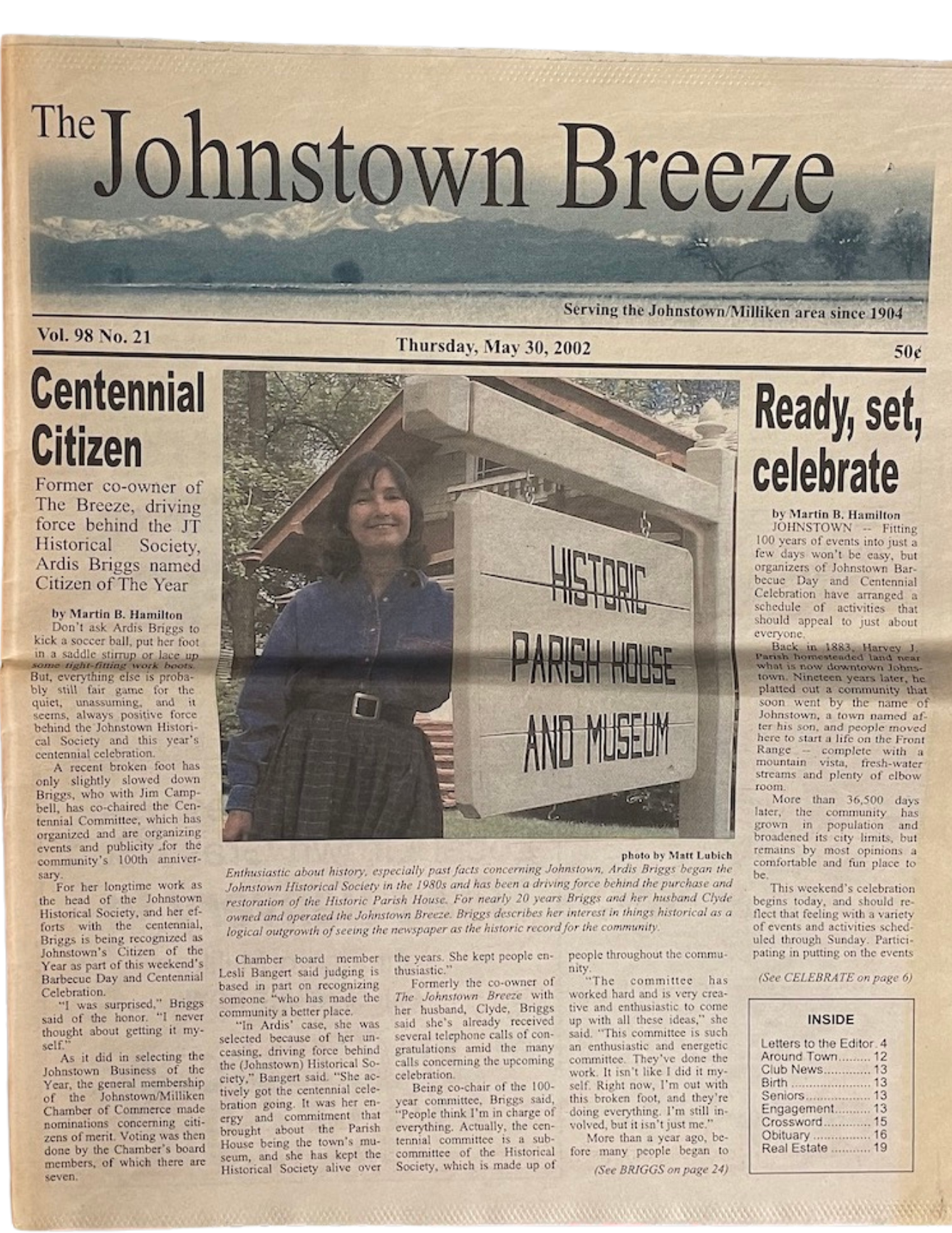 A photo of the front page of The Johnstown Breeze newspaper from May 30, 2002 featuring Ardis Briggs-Tomlinson as Centennial Citizen with a photo of her standing in front the Historic Parish House and Museum.